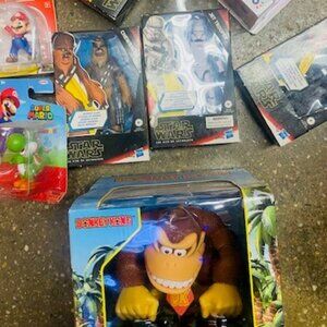 All 9 figurines and collectables  of Star wars, Mario ETC